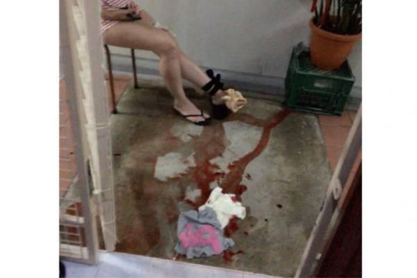 Python bit woman at HDB second storey in Sembawang