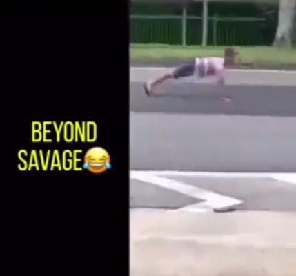 Daredevil Boy Does Push Ups in the Middle of the Road